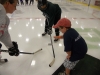 sam-dropping-puck sam-dropping-puck